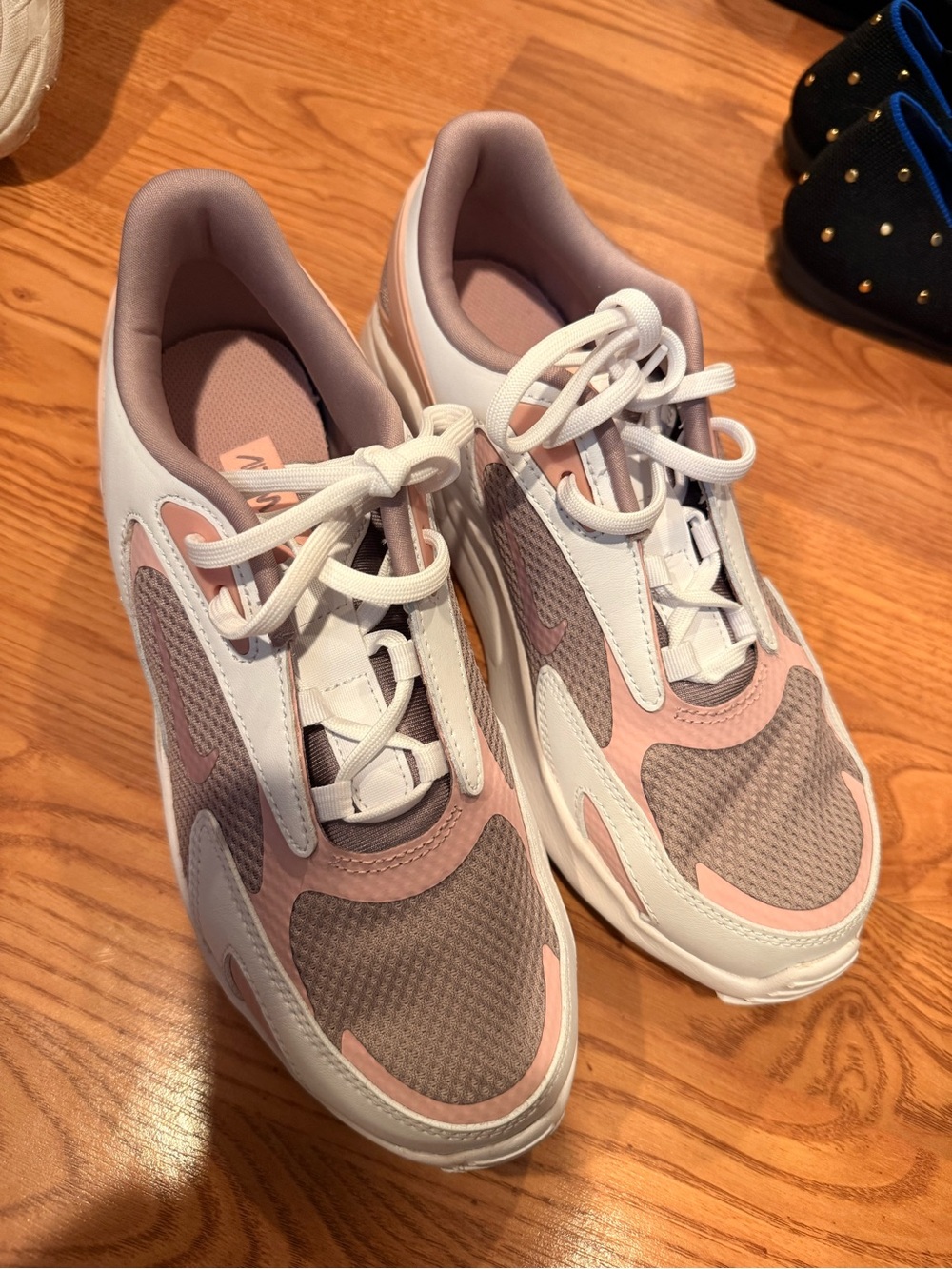 Nike Women’s Pink and White Mesh Lace-Up Sneakers